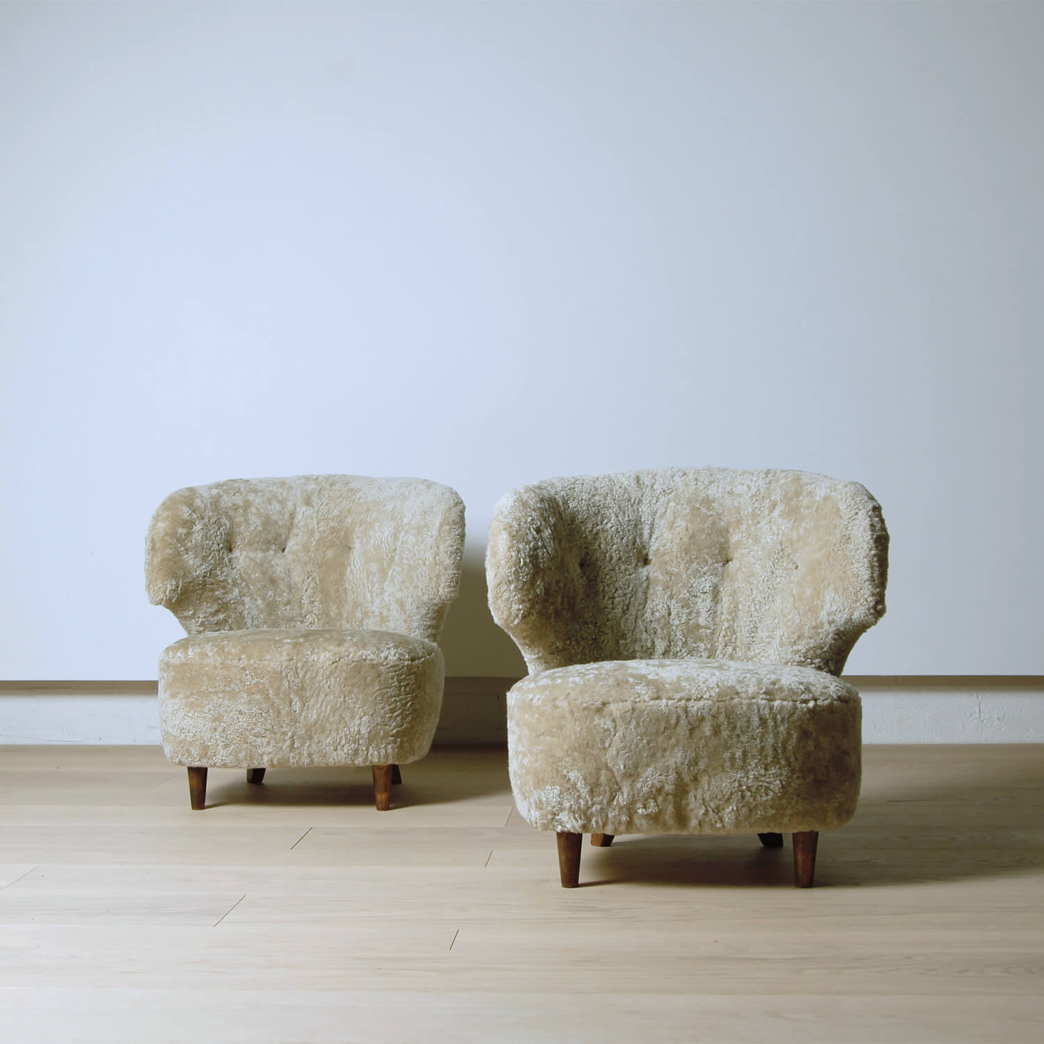 Pair of Shearling Sven Staaf Lounge Chairs
