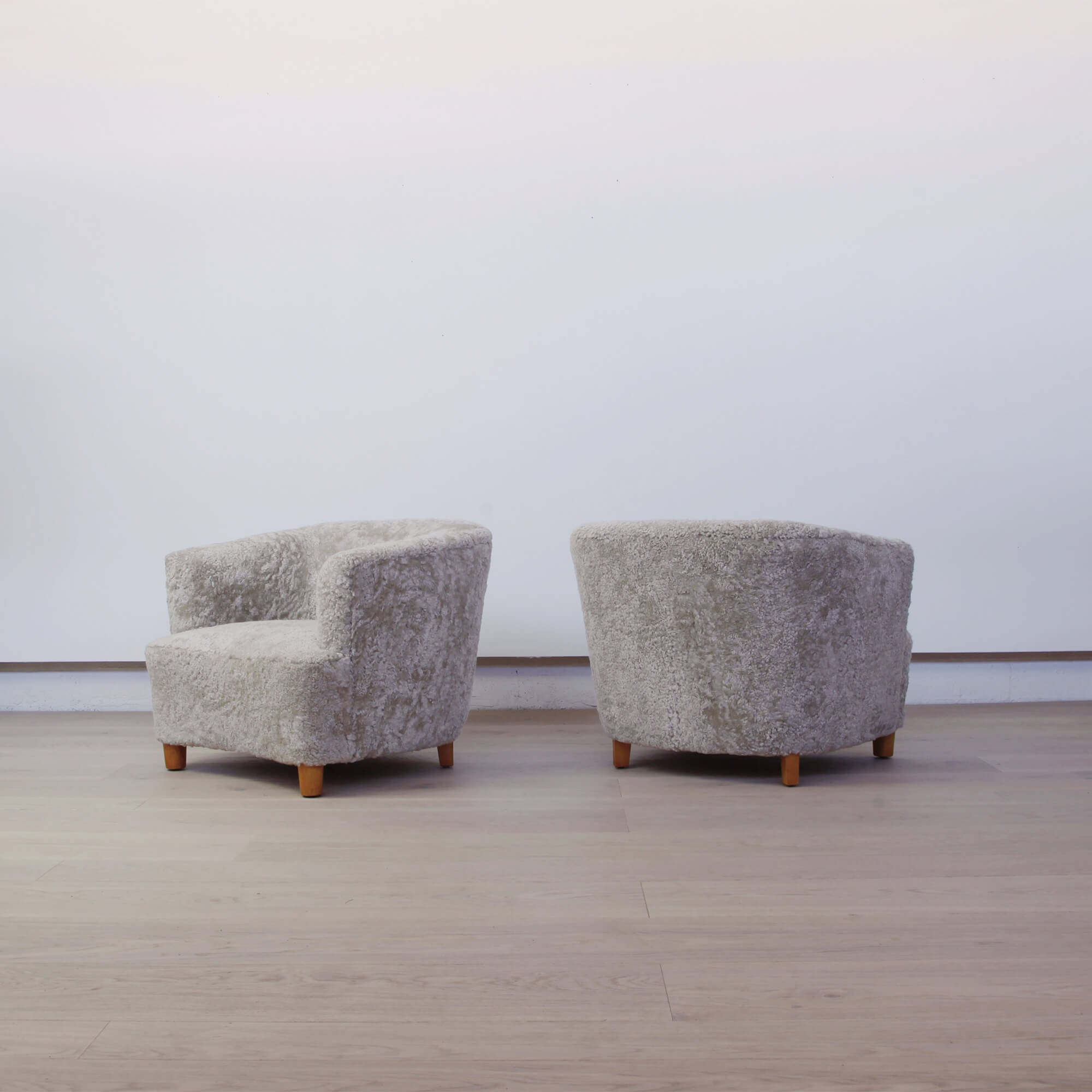 Pair of Shearling-Upholstered Barrel-back chairs by Otto Schulz for Boet