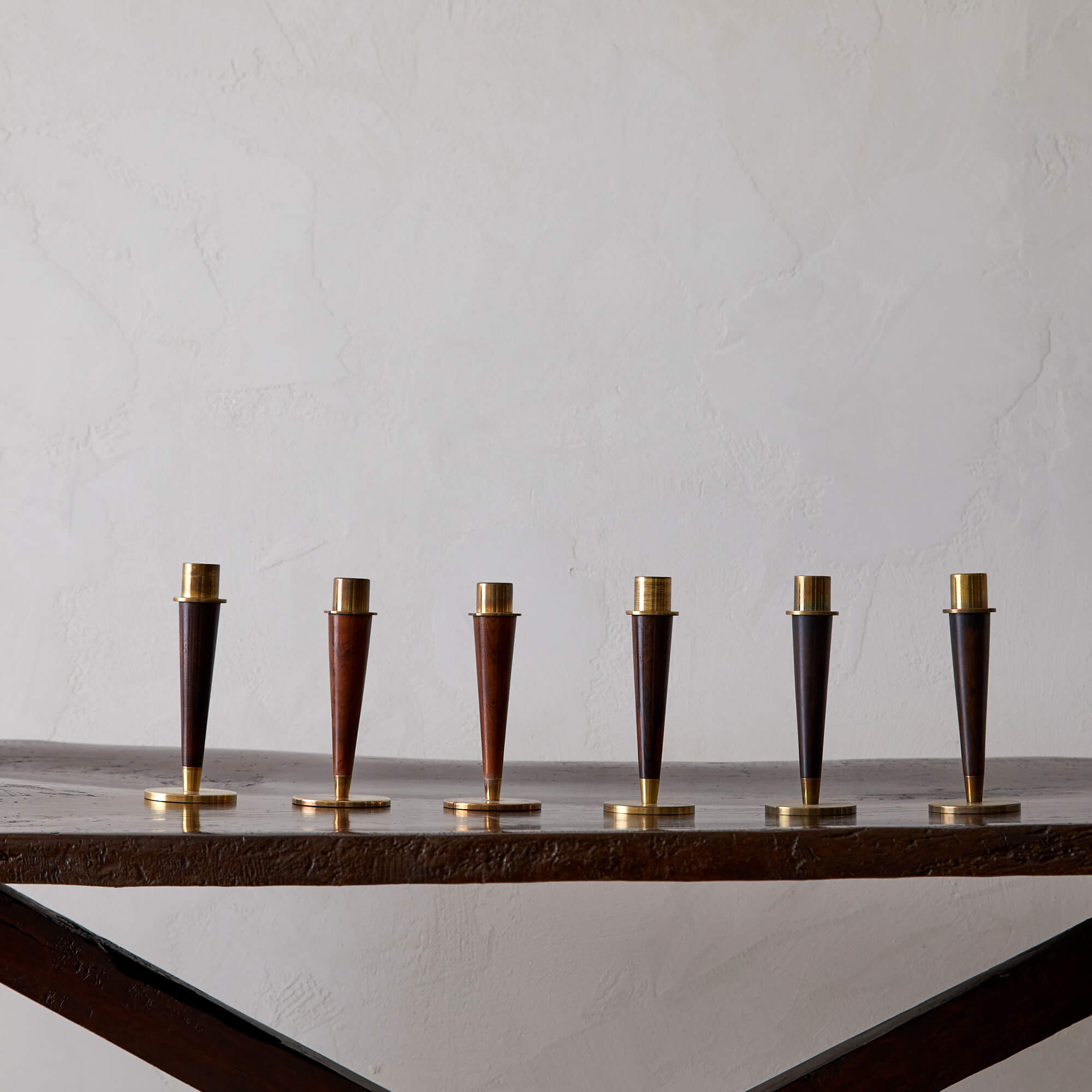 Six Rosewood and Brass Candlesticks