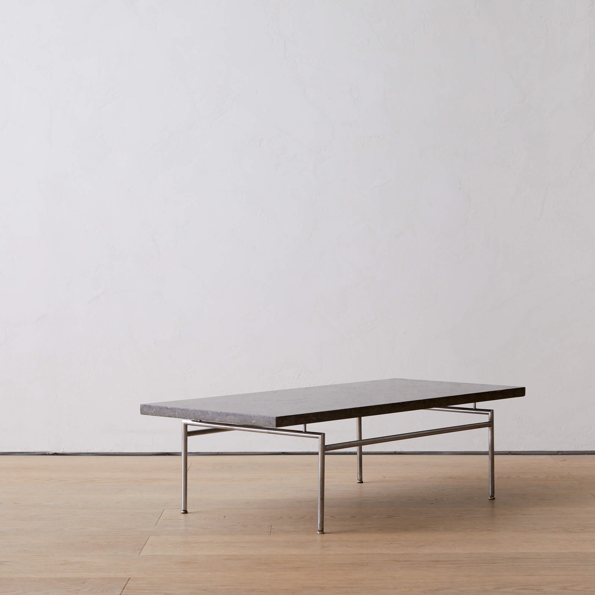 Low coffee table by Poul Norreklit with Öland stone top