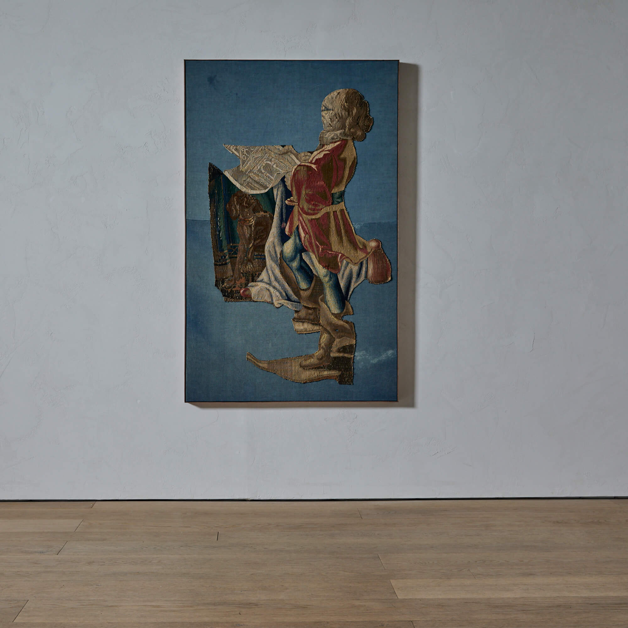 A Tapestry Fragment of a Standing Gentleman with a Dog and a Plan