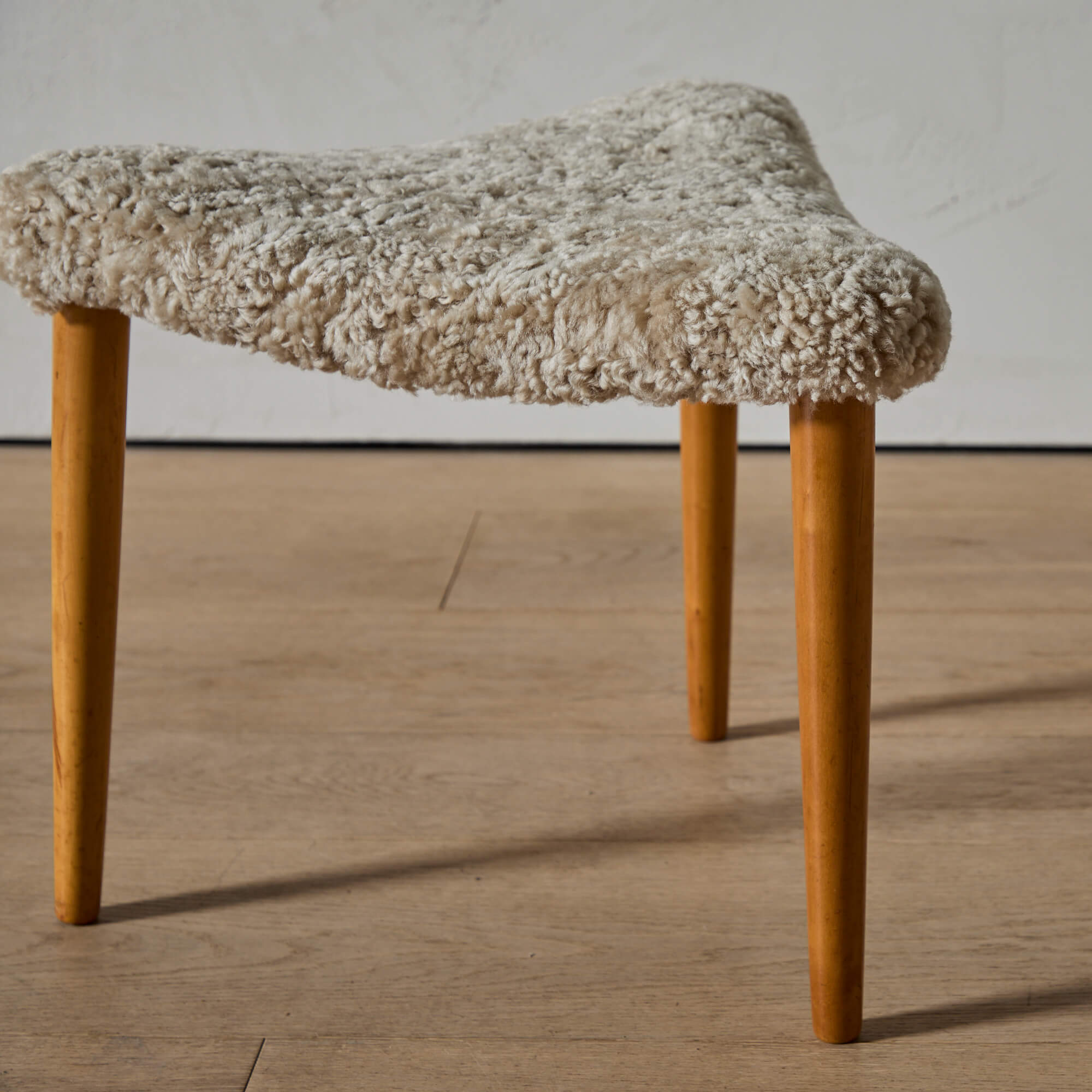 Triangular Stool in Curly Sheepskin
